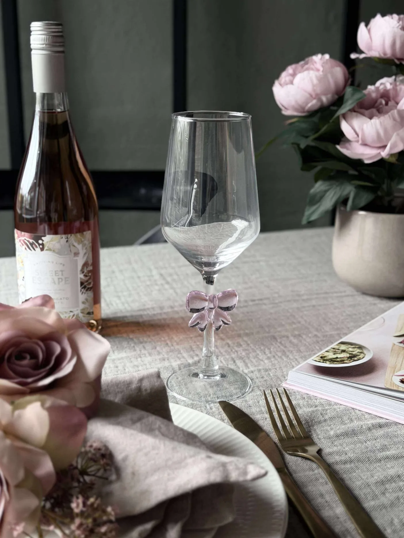 Glas med sløjfe