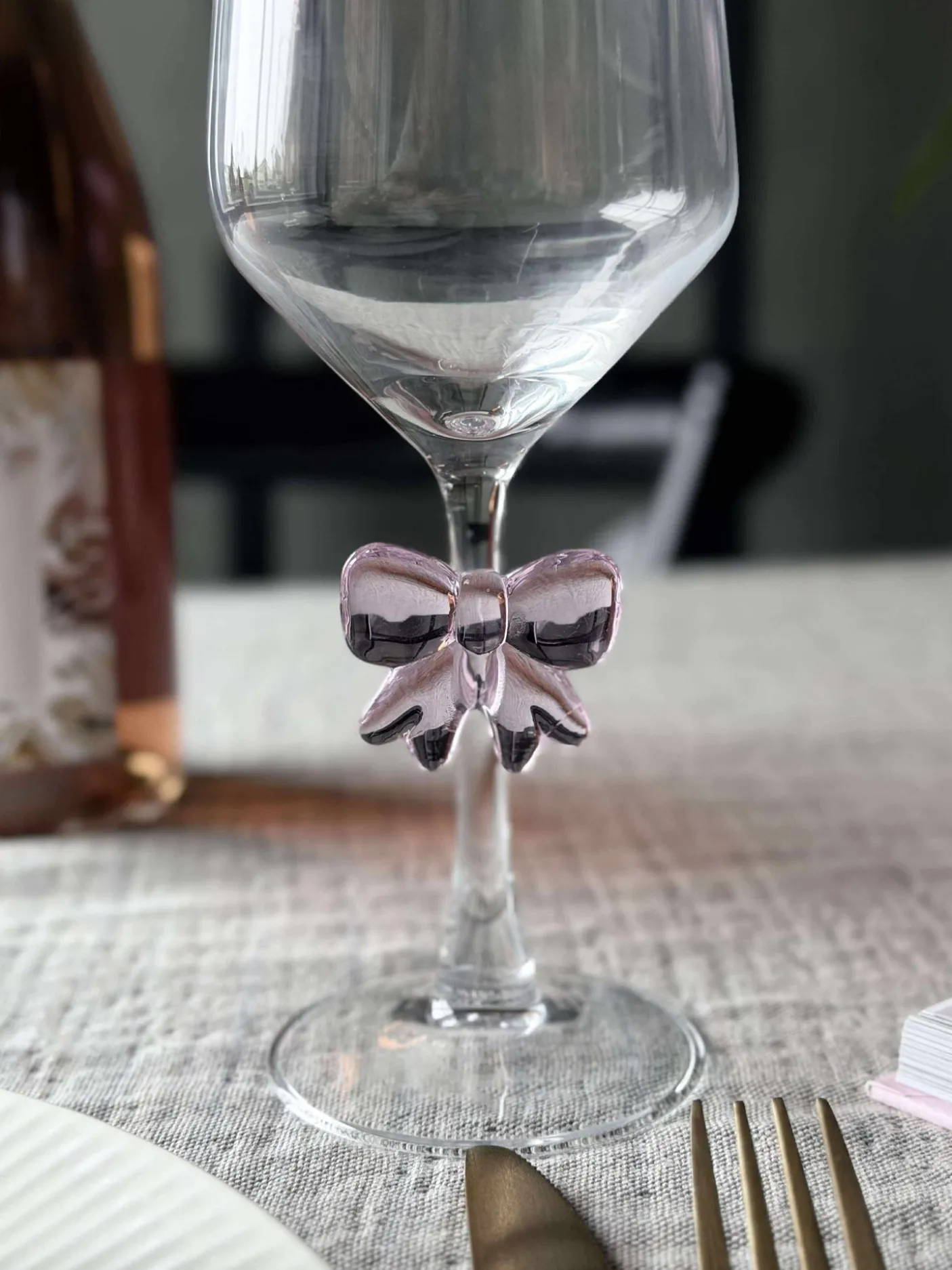 Glas med sløjfe