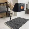 Gulvtæppe i sort skind med hvid tråd - 60x90cm