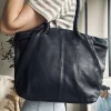 Skuldertaske med smuk fletrem - Black